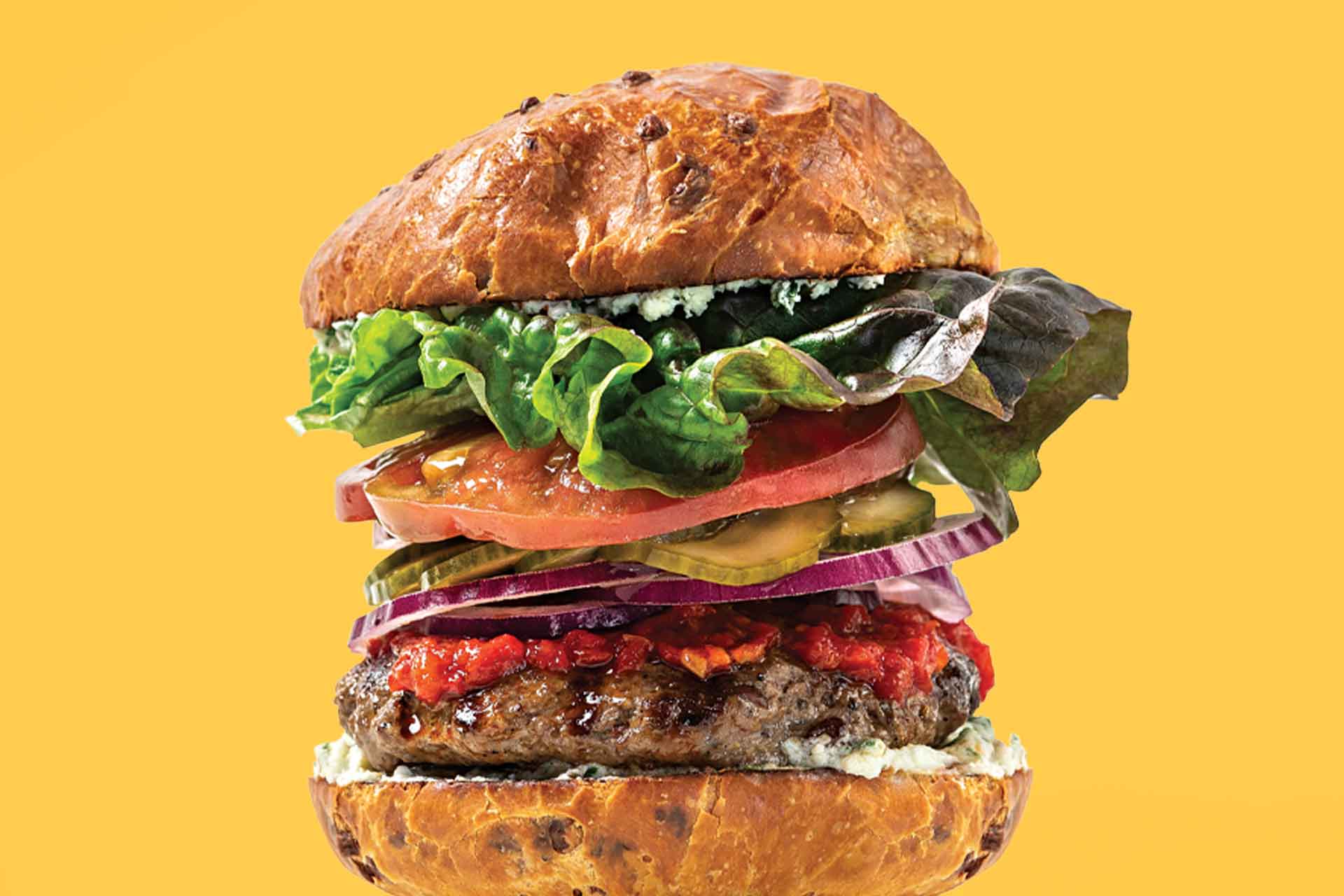 Hamburger with yellow background