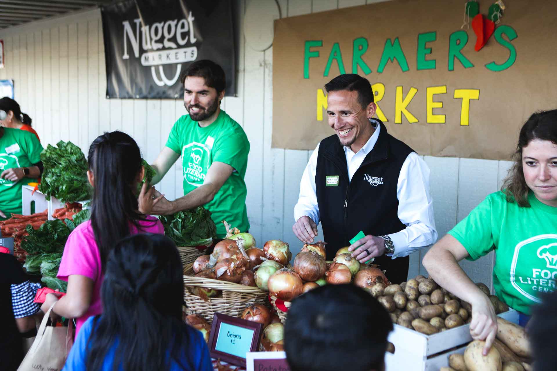 Nugget Markets associate attends Food Literacy Center booth