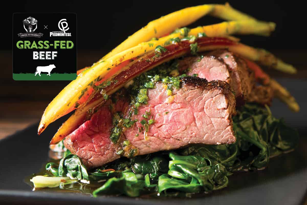 Sirloin Steak On A Bed Of Spinach With Rainbow Carrots On Top Nugget Markets Image