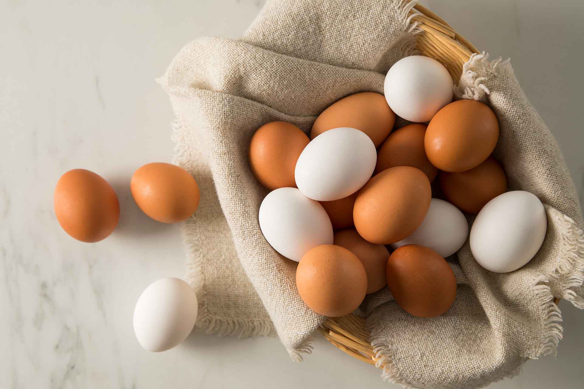 basket of eggs on table